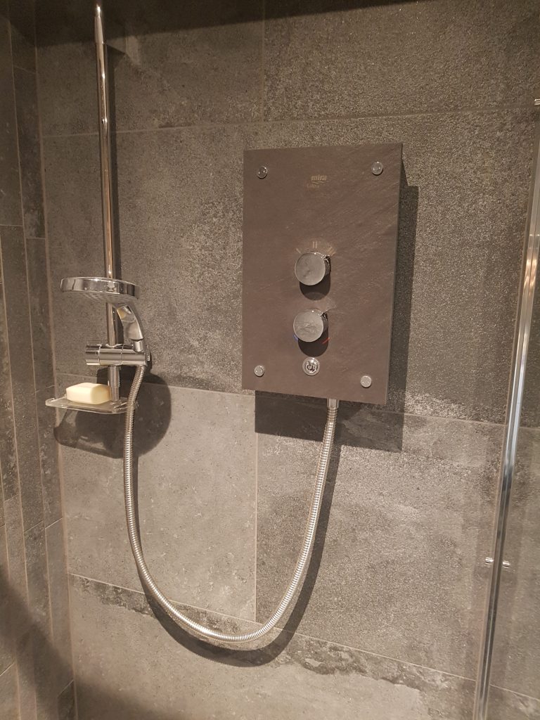 Designer electric shower